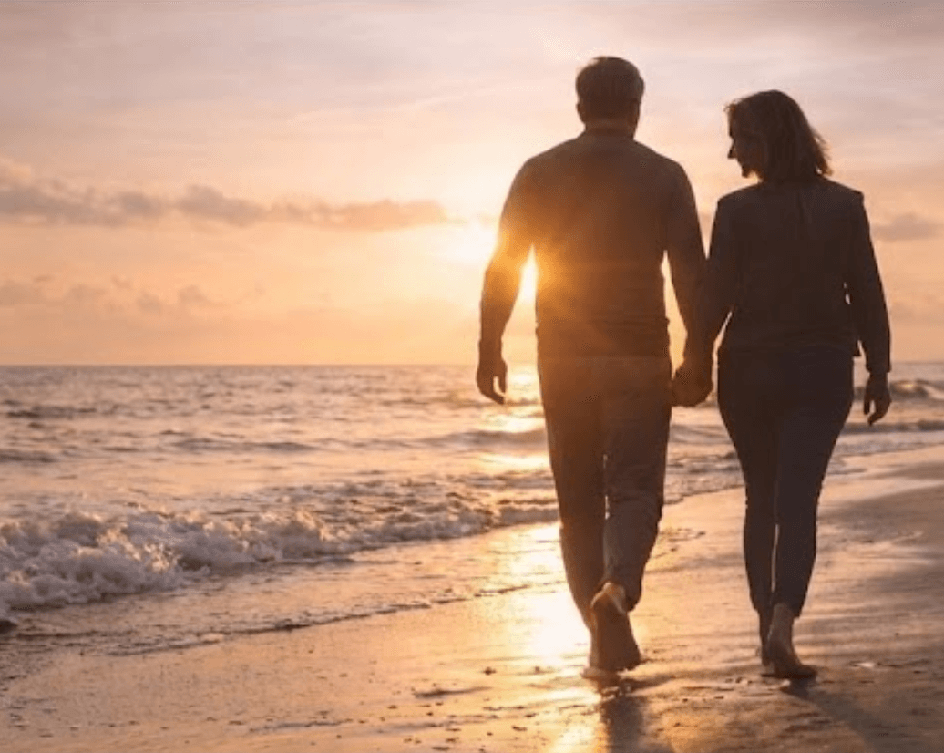 Couple walking on beach